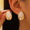 Emerald Glow Teardrop Earrings